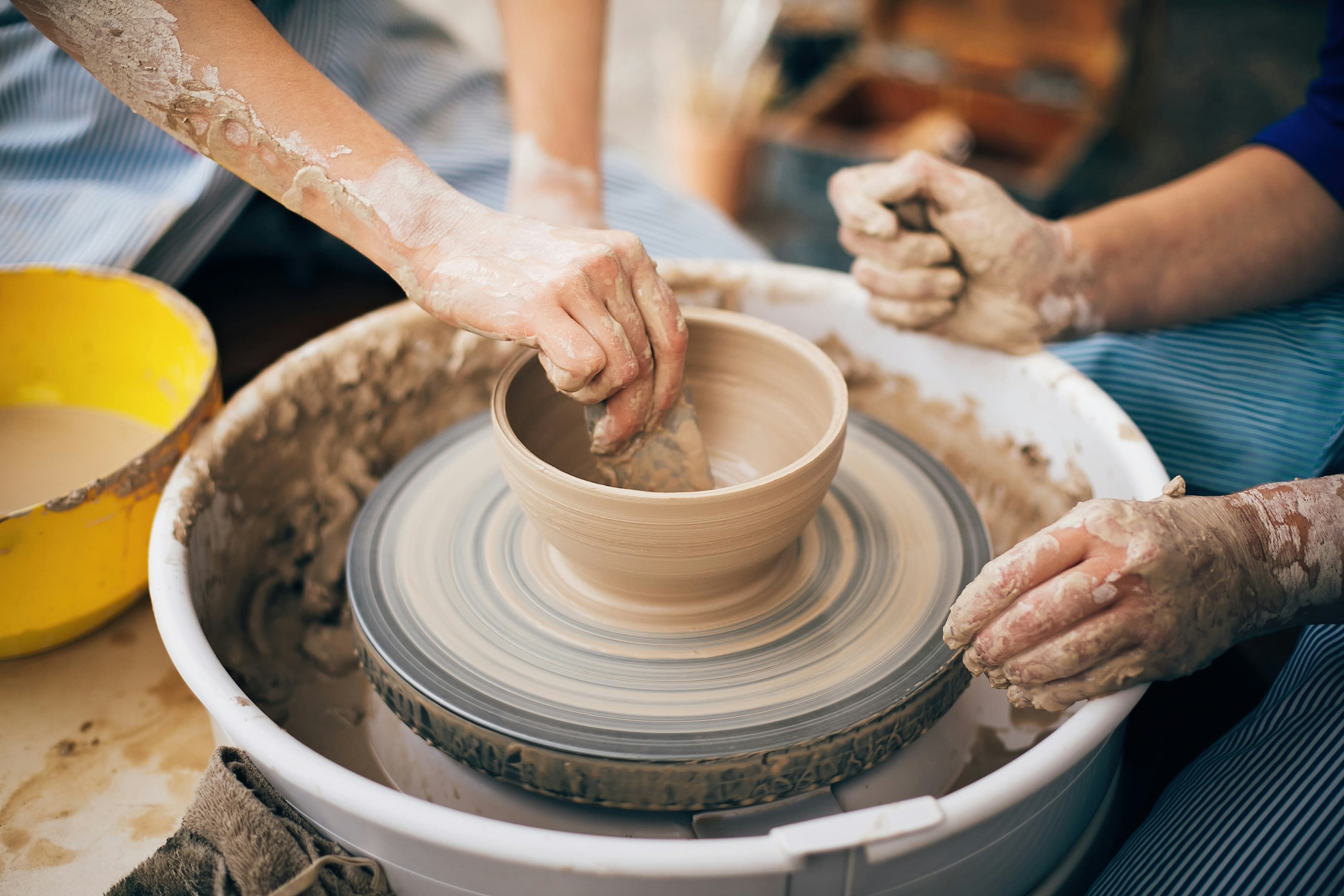 Shape a clay cup, a ceramics class idea in Toronto